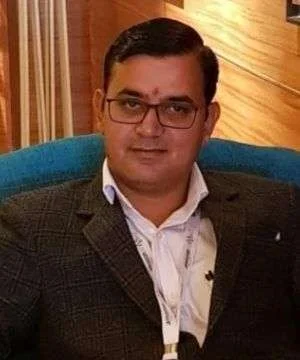Birendra Kandpal - Co-Founder in formal attire