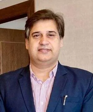 Mr. Sanjeev Dhull - Investor & Business Consultant in formal attire